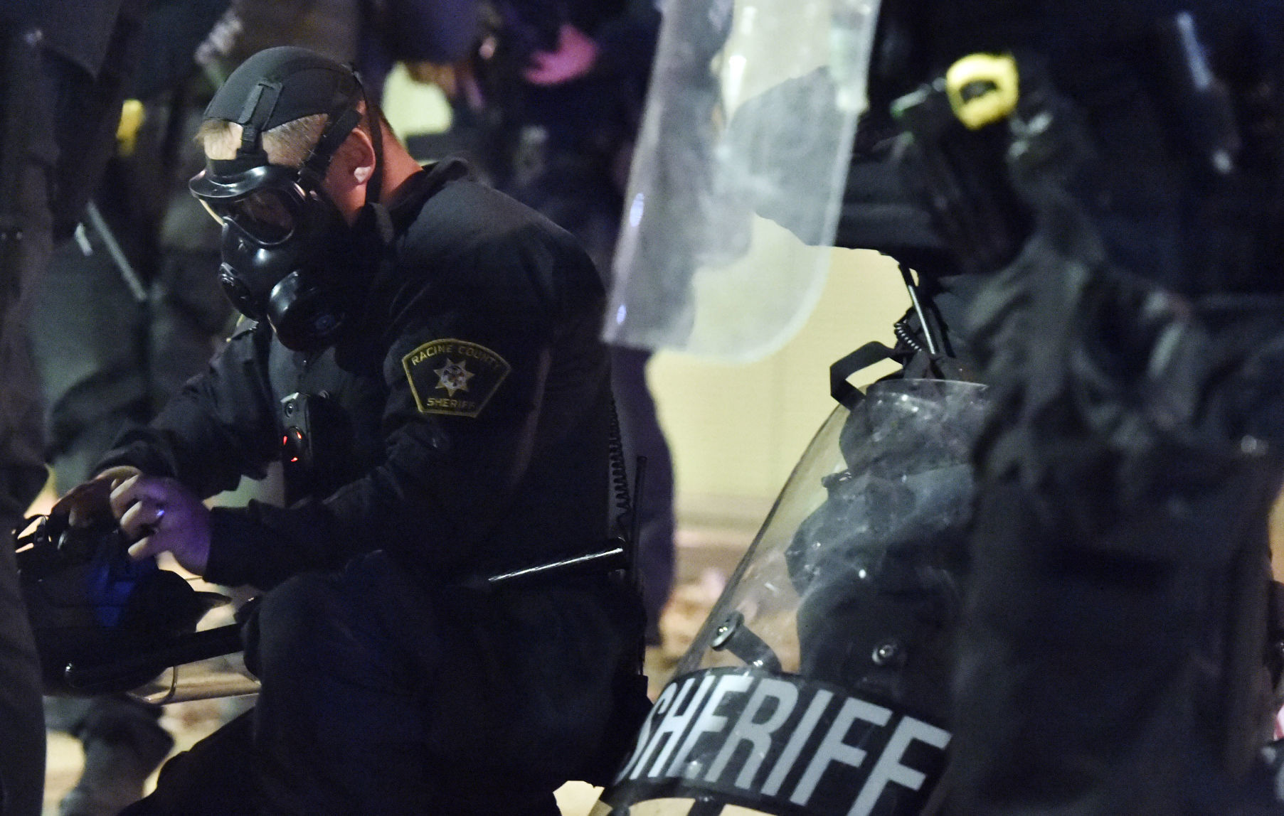 Donning a gas mask